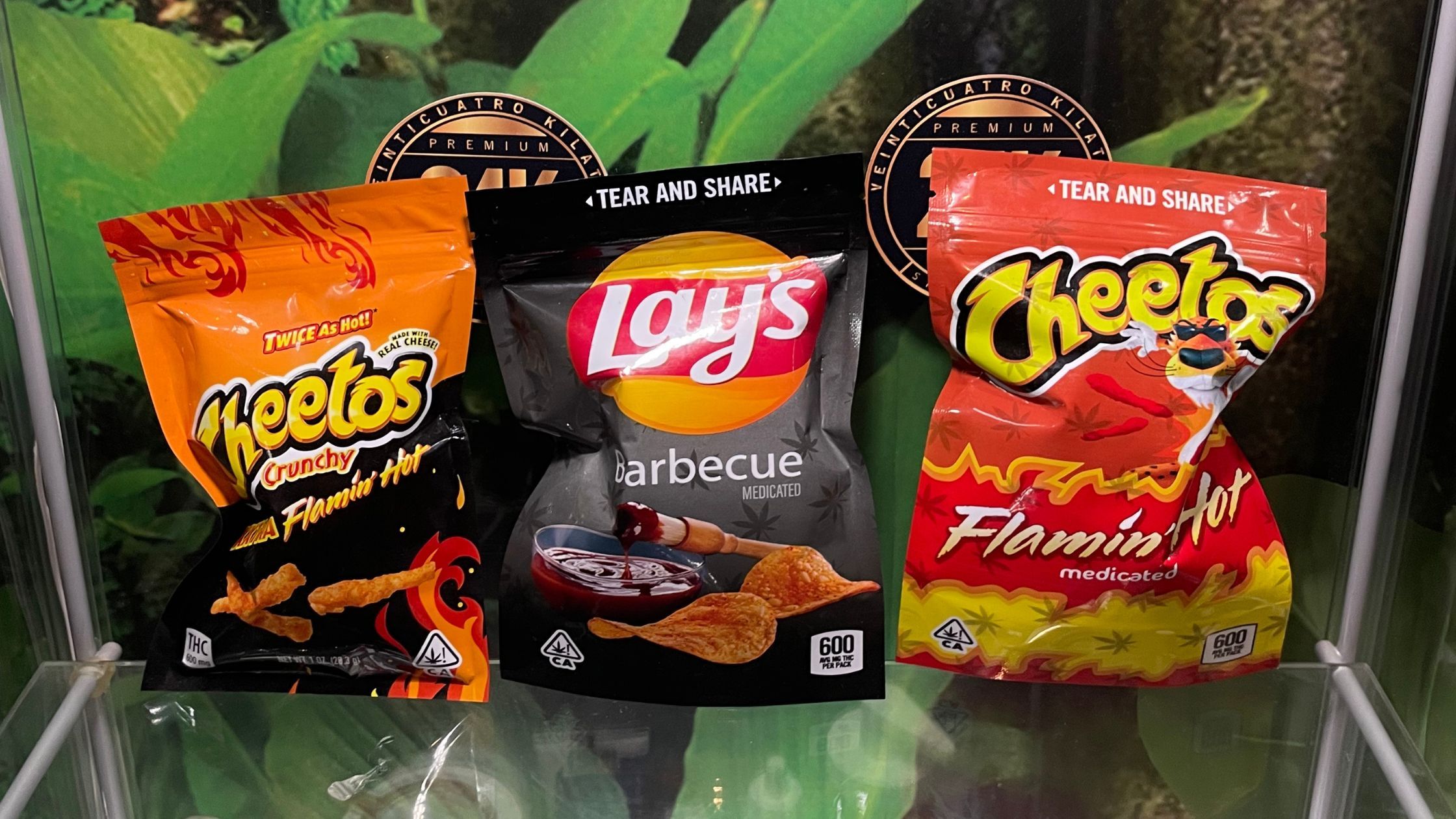 Clubes de cannabis en Madrid con comestibles cerca de Atocha Salamanca y Retiro THC-infused Flamin Hot Cheetos and Lays Barbecue medicated chips with 600mg THC displayed at exclusive cannabis club near Atocha Madrid Spain